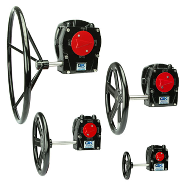 4 different sized cast iron manual gearboxes with indicators and handwheels